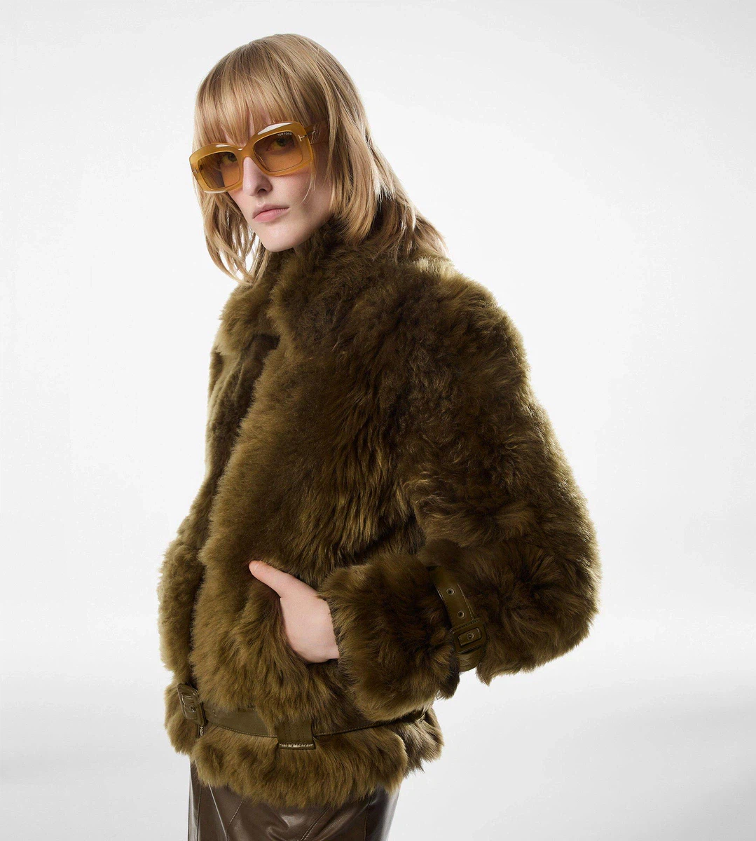 CAZADORA DE BORREGO CON DETALLES DE CUERO